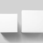 Facing View of 2 Lying Square Boxes Mockup