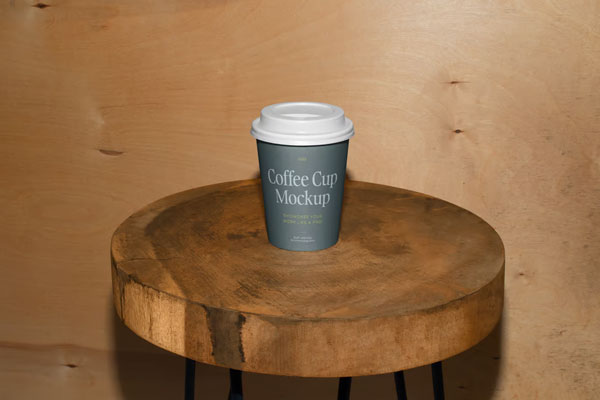 Facing View of Coffee Cup Mockup on Wooden Stool