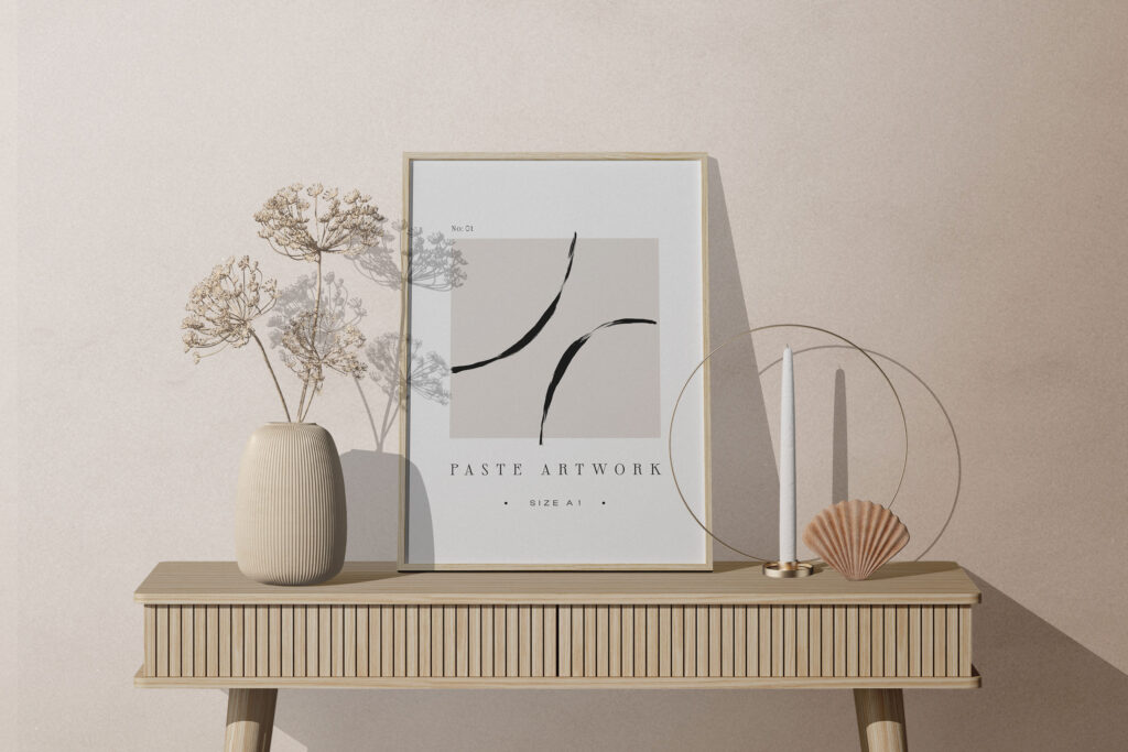 Facing View of Frame Mockup on Table with Decorative Plant
