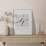 Facing View of Frame Mockup on Table with Decorative Plant