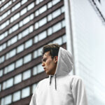 Facing view of Man Wearing Hoodie Mockup