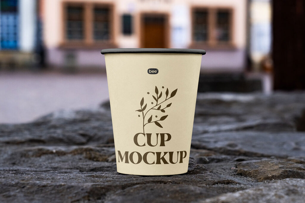Facing View of Open Paper Cup Mockup on Wall