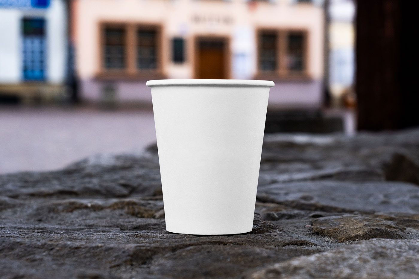 Free Facing View of Open Paper Cup Mockup on Wall PSD Template