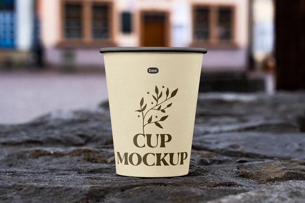 Facing View of Open Paper Cup Mockup on Wall
