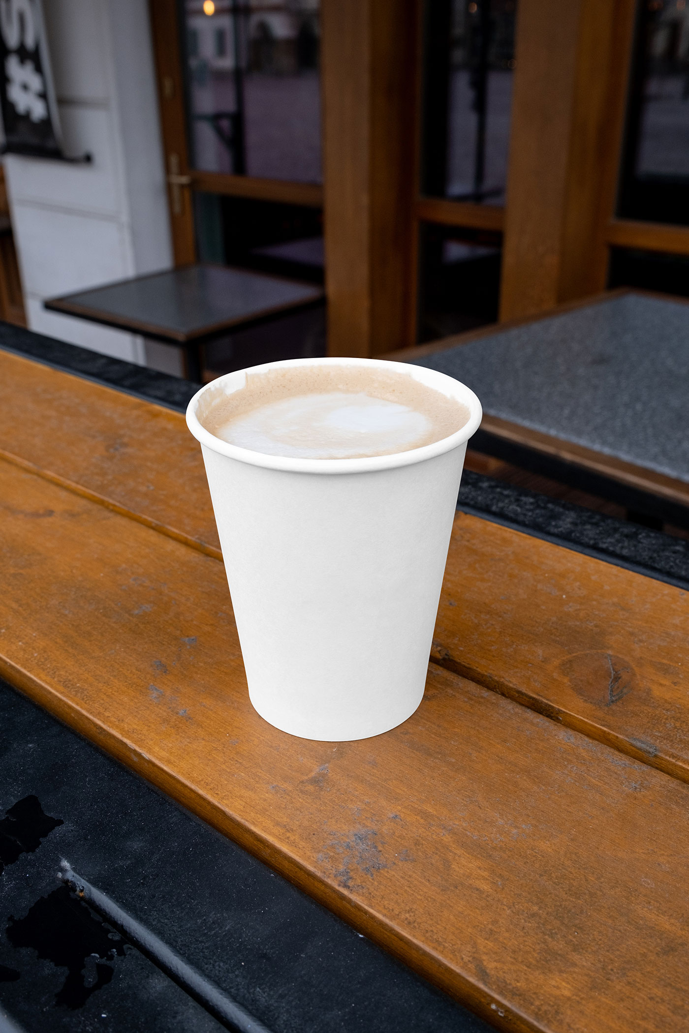 Free Facing View of Paper Cup Mockup with Coffee PSD Template