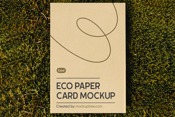 Facing View of Vertical Paper Card Mockup on Grass