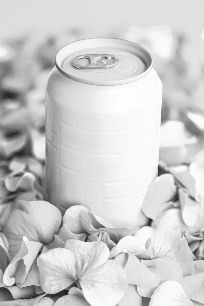 Facing Vision of Aluminum Can Mockup in Flower Petals
