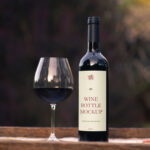 Facing Vision of Wine Bottle Mockup with Glass