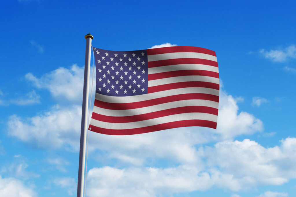 Flag Flapping in the Wind in Blue Sky Mockup