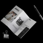 Floating A4 Trifold Brochure Mockup Featuring Binding Clip and a Pen