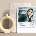 Flyer Leaning Against Stone Slab in Front View Mockup