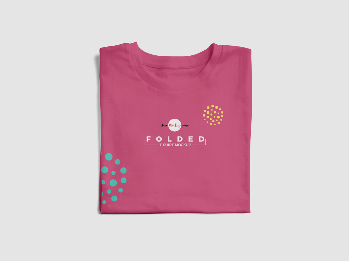 Folded T-shirt Placed in the Top View Mockup FREE PSD