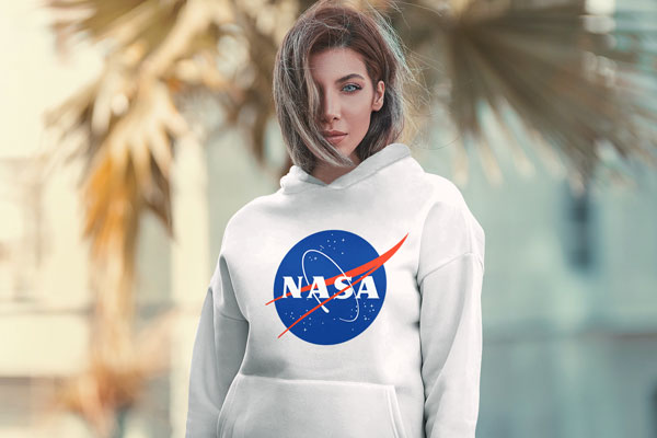 Half-Side View Hoodie Mockup Featuring a Girl Standing Outdoors