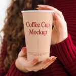 Front Shot of Coffee Cup Mockup in Women Hands