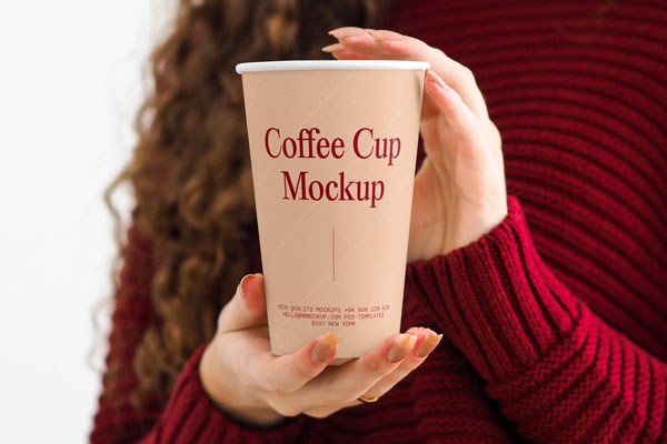 Front Shot of Coffee Cup Mockup in Women Hands