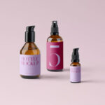 Front Sight of 3 Cosmetics Bottles Mockup