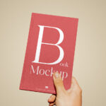 Front Sight of Book Cover Mockup in Hand