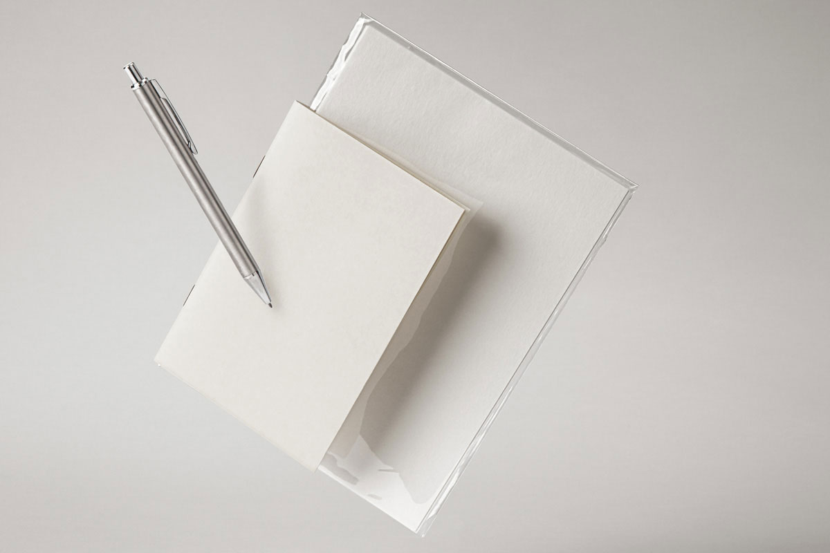 Free Front Sight of Floating Stationery Mockup with Pen PSD Template