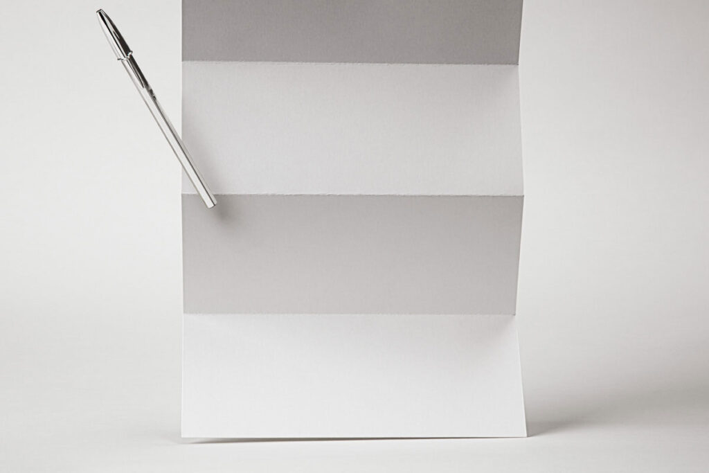 Front Sight of Folded Paper Mockup with Pen