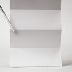 Front Sight of Folded Paper Mockup with Pen
