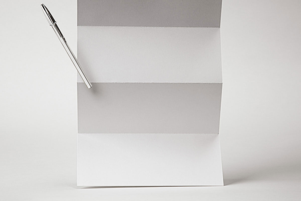 Free Front Sight of Folded Paper Mockup with Pen PSD Template