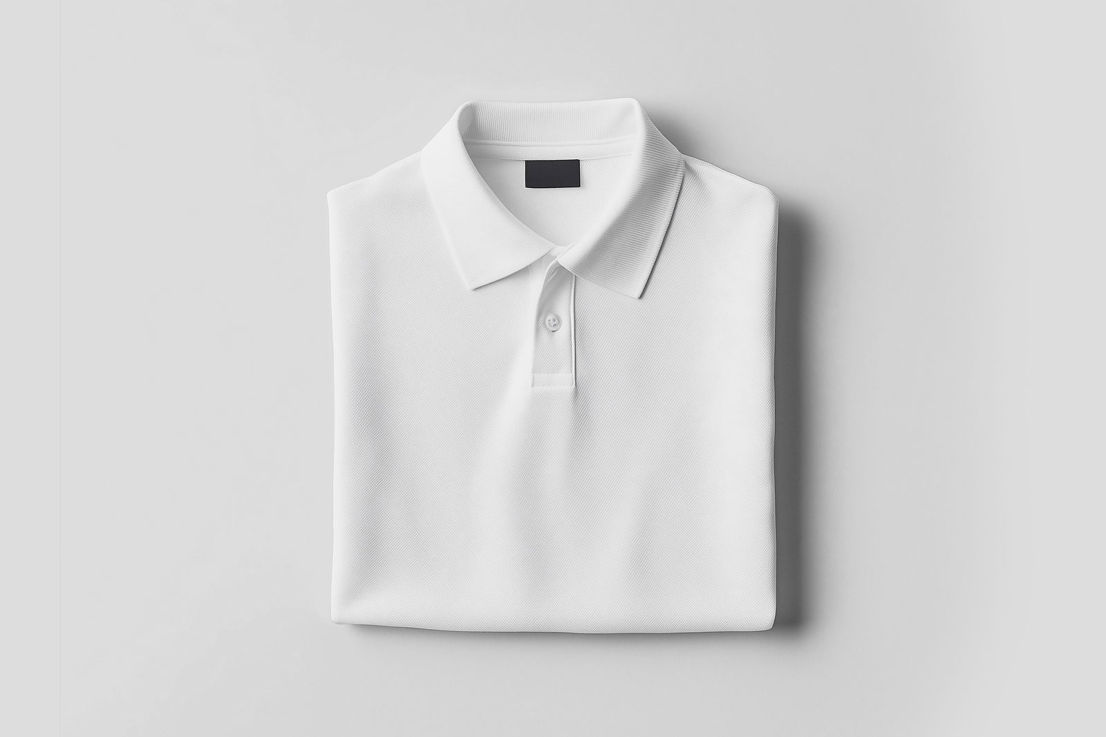 Free Front Sight of Folded Polo Shirt Mockup PSD Template