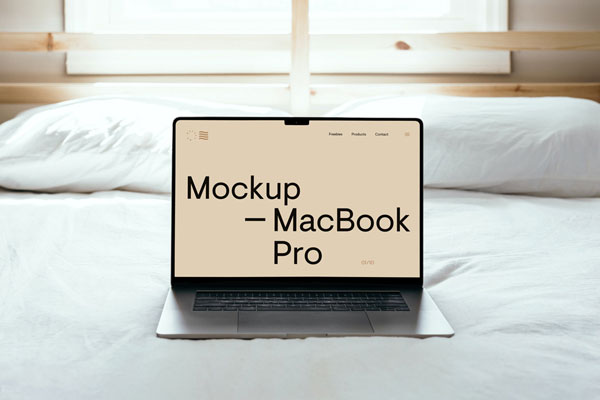 Front Sight of MacBook Pro Mockup on Bed