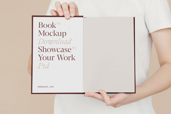 Front Sight of Open Book Mockup Holding by Man