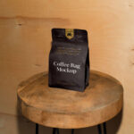 Front Sight of Paper Coffee Bag Mockup on Wooden Stool