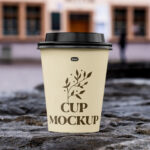 Front Sight of Paper Cup Mockup on Stone Wall