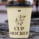 Front Sight of Paper Cup Mockup on Stone Wall