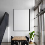 Front Sight of Poster Mockup in Living Room on Wall