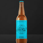 Front View Amber Beer Bottle Label Mockup with Metal Lid