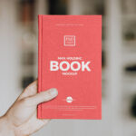Front View Book in Hand Mockup