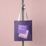 Front View Canvas Bag Hanging on Tripod Mockup