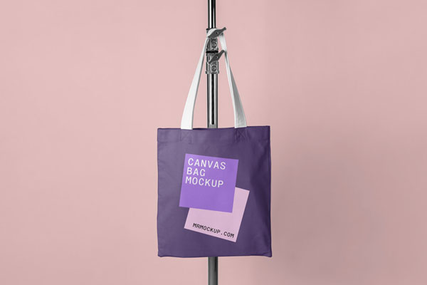 Front View Canvas Bag Hanging on Tripod Mockup