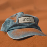 Front View Cap with Patch Mockup on Sand