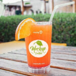 Front View Cocktail Mockup with Straw in Outdoor Setting