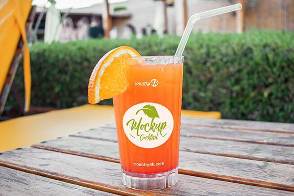 Front View Cocktail Mockup with Straw in Outdoor Setting