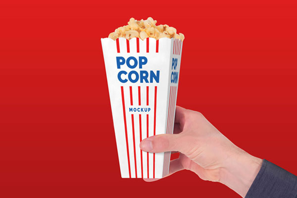 Front View Hand Holding Movie Theater Popcorn Paper Box Mockup