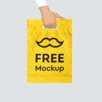 Front View Hand Holding Plastic Shopping Bag Mockup