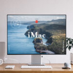 Front View iMac on a Wooden Work Desk Mockup