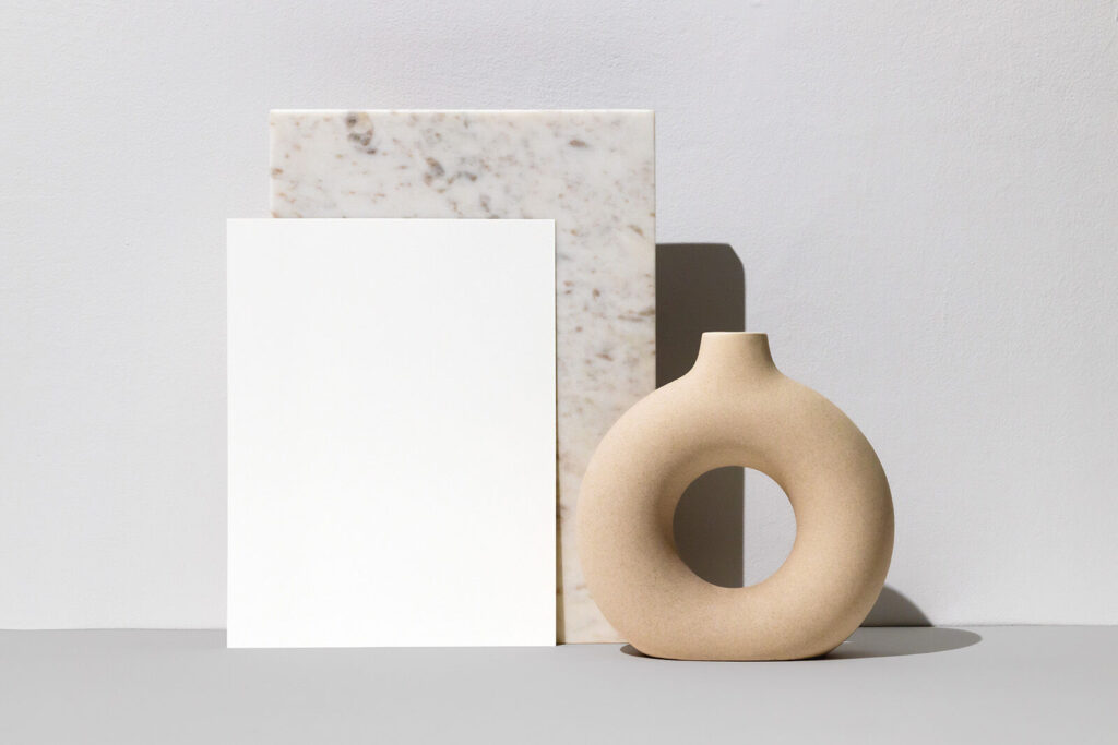 Front View Letter Flyer Leaning Against Marble Stone Mockup