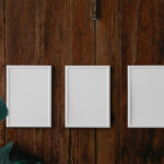 Front View of 3 Minimal Posters Mockup on Wood Wall