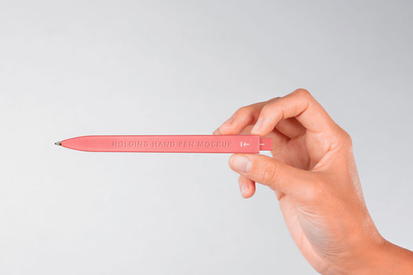 Front View of a Branding Pen Held Up by a Hand Mockup