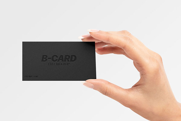 Front View of a Business Card Held Up by Hand Mockup