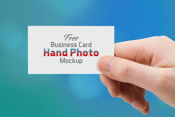 Front View of a Business Card Held Up by a Hand Mockup