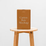 Front View of a Cardboard Box Mockup on a Wooden Chair