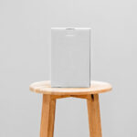 Front View of a Cardboard Box Mockup on a Wooden Chair