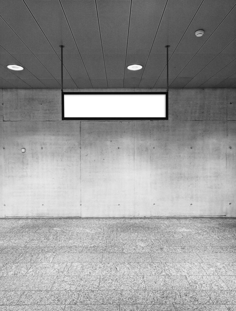 Front View of a Concrete Wall Mockup and a Hanging Sign Mockup